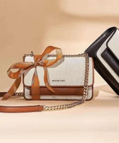 Claire Schultertasche Canvas natur/schwarz